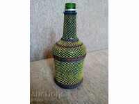An old knit bottle, a bottle