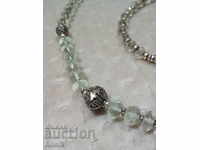 GREEN AMETHYSTE NECKLACE AND BRACELET WITH SILVER ELEMENTS.