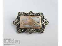 Old ladies silver brooch with gold butterfly