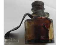 An old ink cartridge, a soda ink bottle