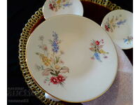 A plate for bites of Bavarian porcelain, gold, flowers.