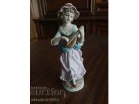A beautiful, collectible porcelain figure from porcelain marked